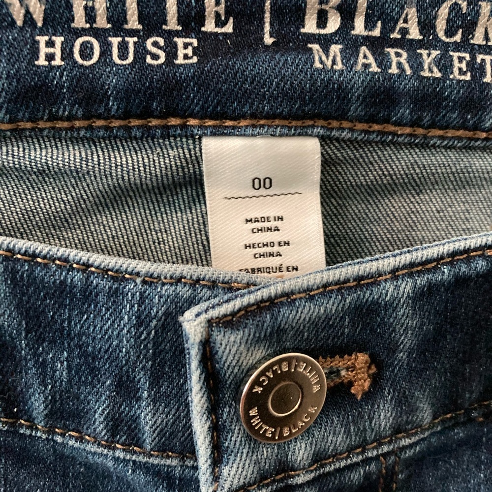 White House Black Market dark blue slim unhemmed leg jeans, size O